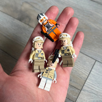 LEGO Star Wars 8083 Rebel Trooper Battle Pack Set is a 2009 release containing 79 pieces. The set includes four minifigures: Zev Senesca, a Hoth Officer, and two Rebel Soldiers in cold-weather Hoth gear, along with a Rebel combat speeder equipped with flick-firing missiles. It was designed to represent Rebel forces from Star Wars: The Empire Strikes Back.