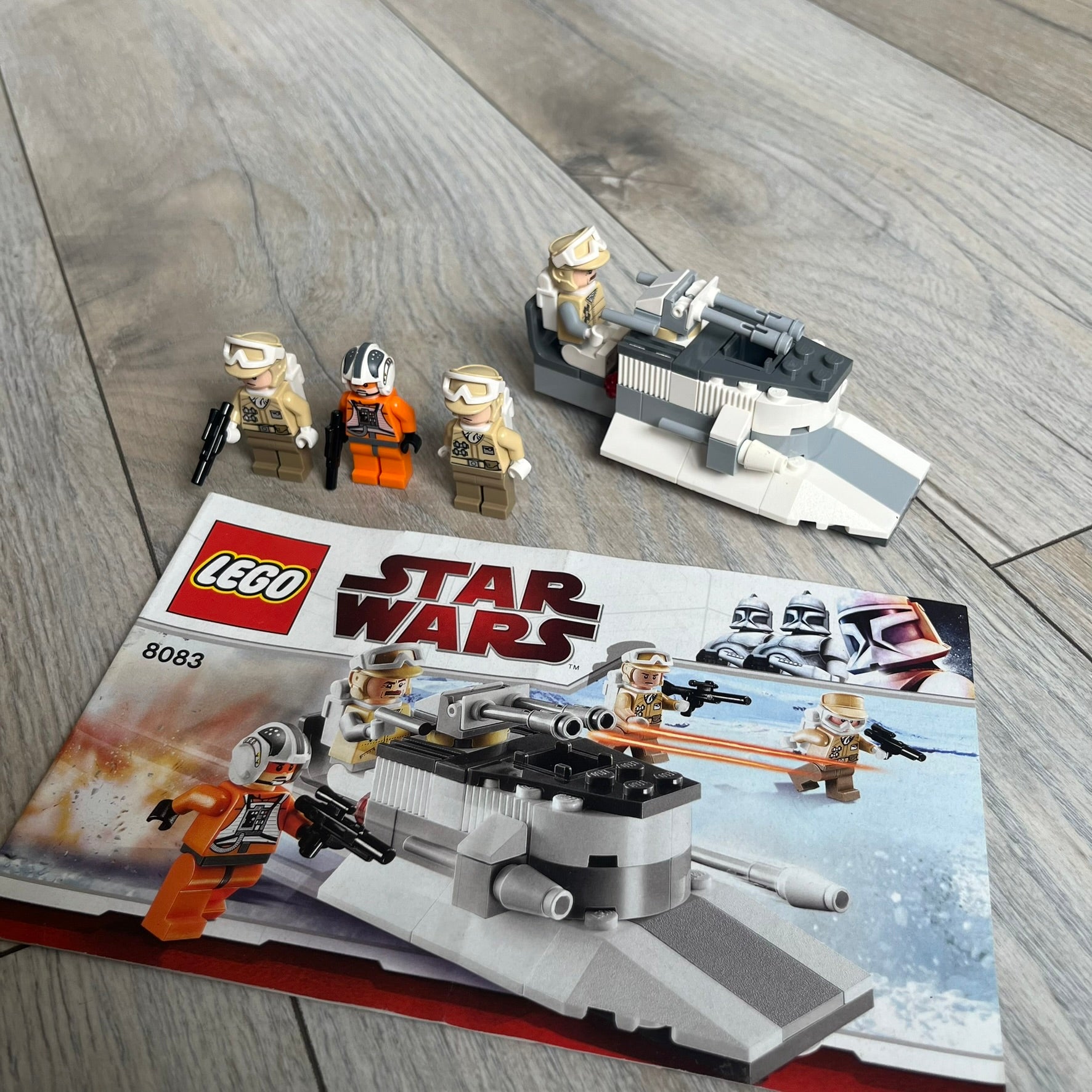 LEGO Star Wars 8083 Rebel Trooper Battle Pack Set is a 2009 release containing 79 pieces. The set includes four minifigures: Zev Senesca, a Hoth Officer, and two Rebel Soldiers in cold-weather Hoth gear, along with a Rebel combat speeder equipped with flick-firing missiles. It was designed to represent Rebel forces from Star Wars: The Empire Strikes Back.