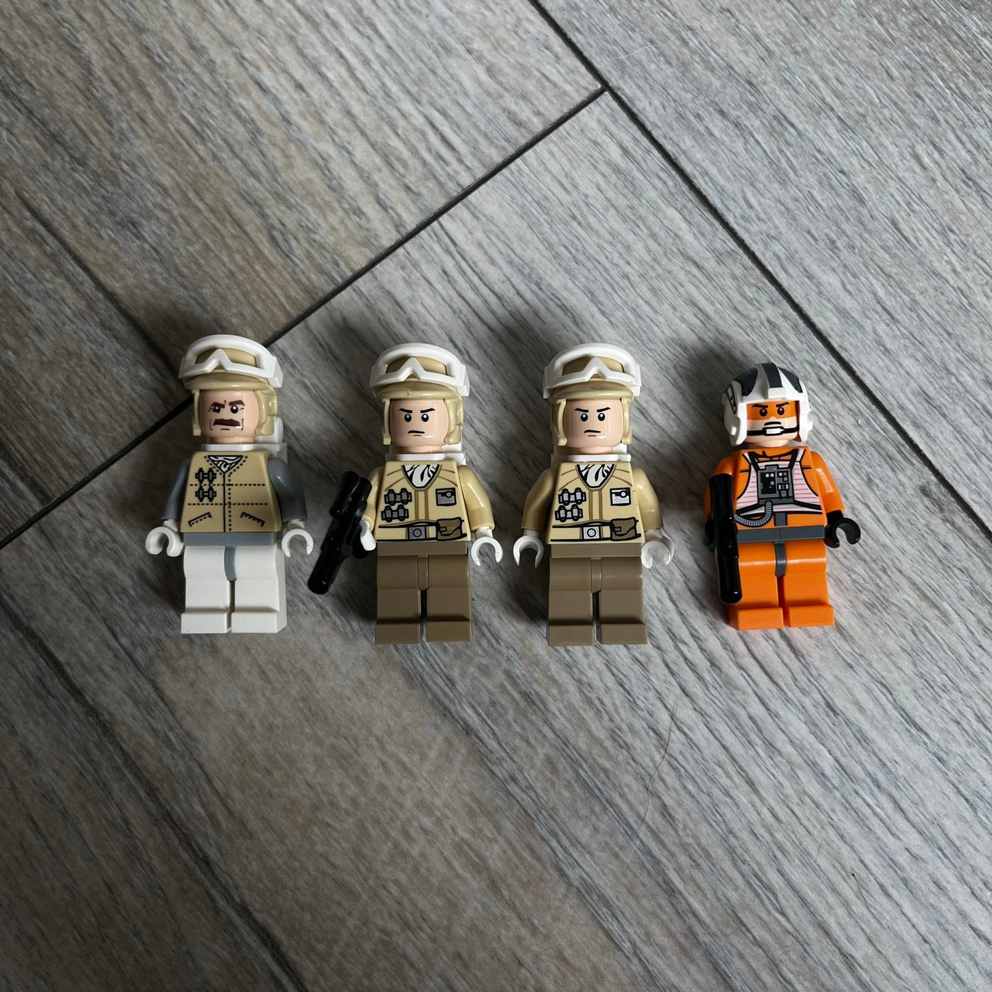 LEGO Star Wars 8083 Rebel Trooper Battle Pack Set is a 2009 release containing 79 pieces. The set includes four minifigures: Zev Senesca, a Hoth Officer, and two Rebel Soldiers in cold-weather Hoth gear, along with a Rebel combat speeder equipped with flick-firing missiles. It was designed to represent Rebel forces from Star Wars: The Empire Strikes Back.
