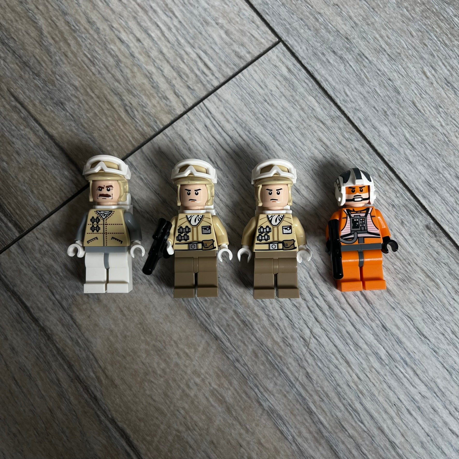 LEGO Star Wars 8083 Rebel Trooper Battle Pack Set is a 2009 release containing 79 pieces. The set includes four minifigures: Zev Senesca, a Hoth Officer, and two Rebel Soldiers in cold-weather Hoth gear, along with a Rebel combat speeder equipped with flick-firing missiles. It was designed to represent Rebel forces from Star Wars: The Empire Strikes Back.