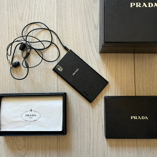 LG Prada 3.0 P940 smartphone full set with box, case, earphones, and original papers. Known for its premium Prada-branded design, the phone runs Android, boasts an 8MP rear camera, and a sharp, sleek look. A unique piece of tech fashion history.