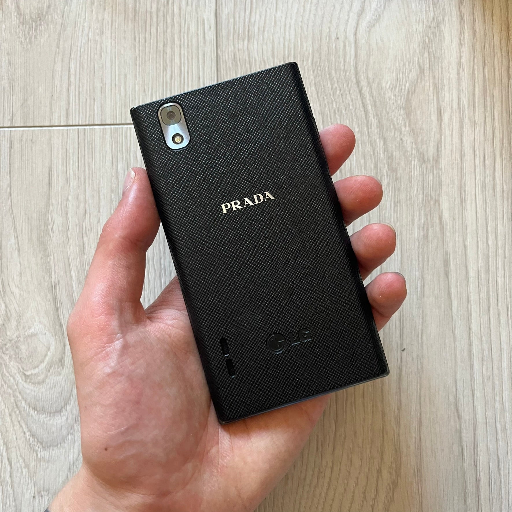 LG Prada 3.0 P940 smartphone full set with box, case, earphones, and original papers. Known for its premium Prada-branded design, the phone runs Android, boasts an 8MP rear camera, and a sharp, sleek look. A unique piece of tech fashion history.
