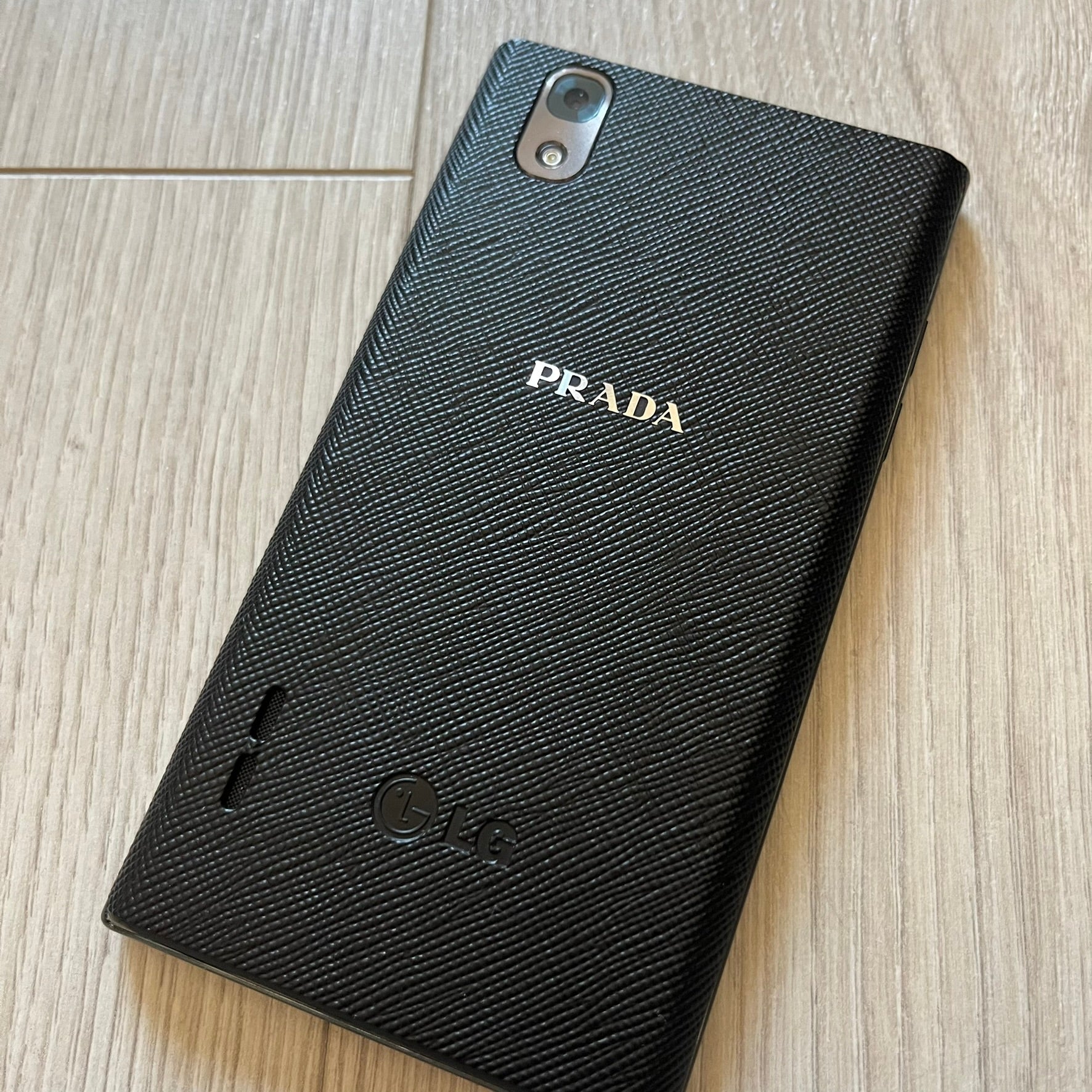 LG Prada 3.0 P940 smartphone full set with box, case, earphones, and original papers. Known for its premium Prada-branded design, the phone runs Android, boasts an 8MP rear camera, and a sharp, sleek look. A unique piece of tech fashion history.