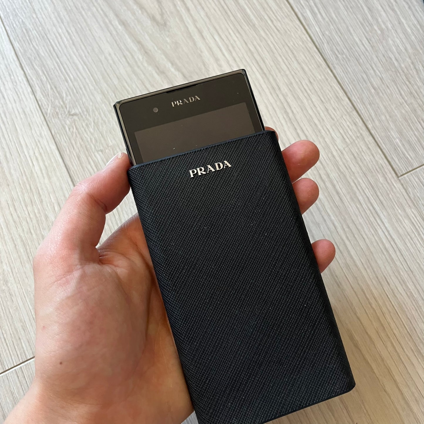 LG Prada 3.0 P940 smartphone full set with box, case, earphones, and original papers. Known for its premium Prada-branded design, the phone runs Android, boasts an 8MP rear camera, and a sharp, sleek look. A unique piece of tech fashion history.