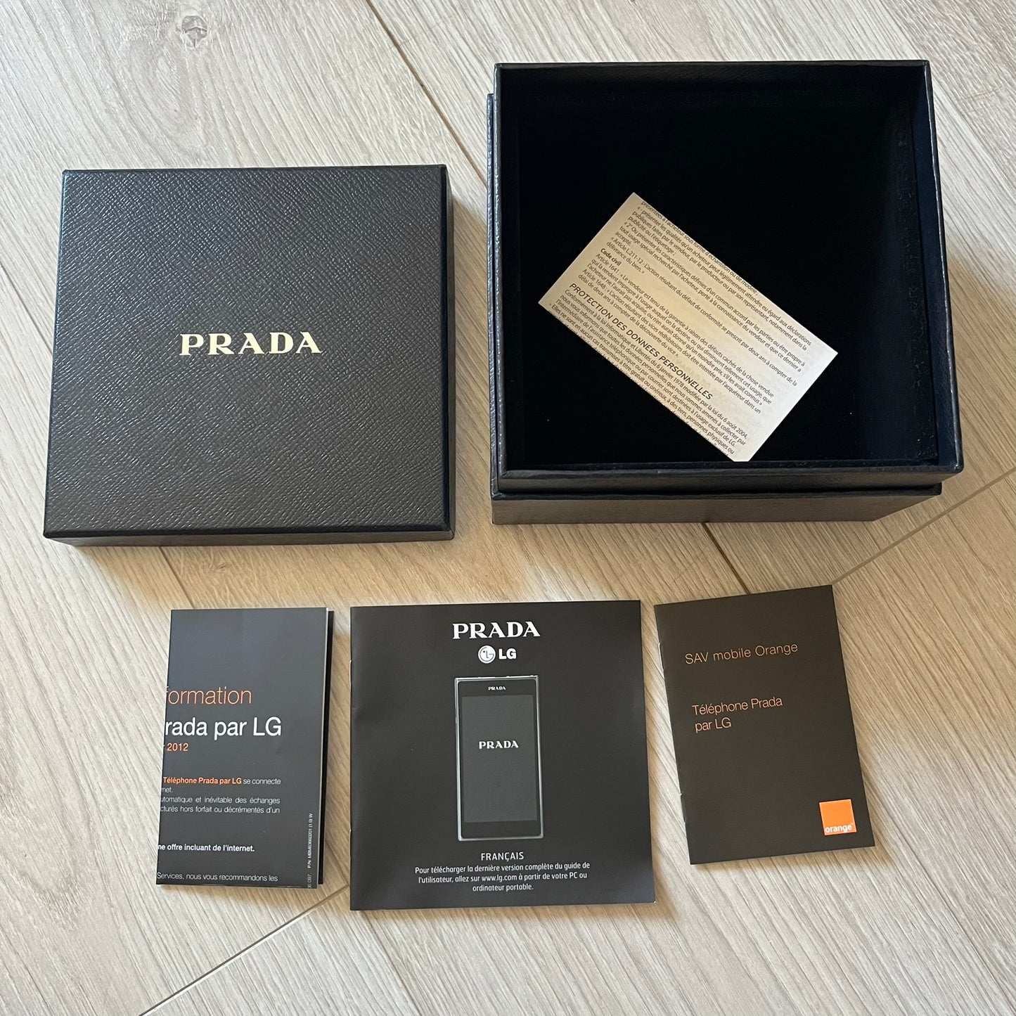LG Prada 3.0 P940 smartphone full set with box, case, earphones, and original papers. Known for its premium Prada-branded design, the phone runs Android, boasts an 8MP rear camera, and a sharp, sleek look. A unique piece of tech fashion history.