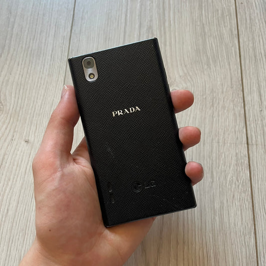 Non-functional LG Prada 3.0 P940 with cracked display, perfect for repair or as a display item. This model represents the last collaboration between LG and Prada, combining luxury design with early 2010s smartphone tech. A rare find despite its condition.