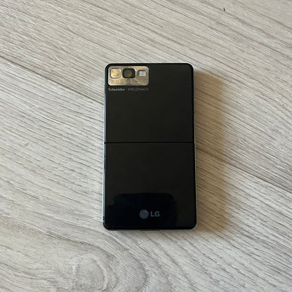 LG Prada KE850 touchscreen phone, the first of its kind with a capacitive display, designed in collaboration with Prada. Sleek black minimalist design, pre-loaded games, PDF and Office support, Bluetooth, and expandable memory. Comes complete with Prada box and leather etui - a collectible milestone in mobile fashion history.