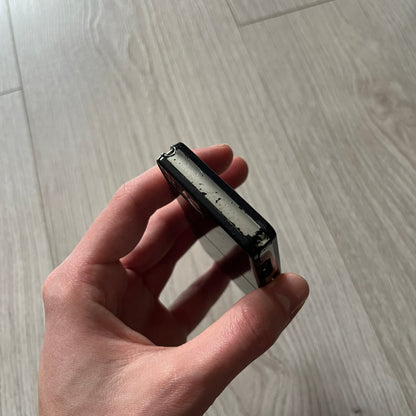 The LG Prada KE850, a groundbreaking collaboration between LG and Prada marked the world’s first capacitive touchscreen phone. Finished in sleek black with minimalist Prada aesthetics, it features media playback, Bluetooth, and expandable memory.&nbsp;