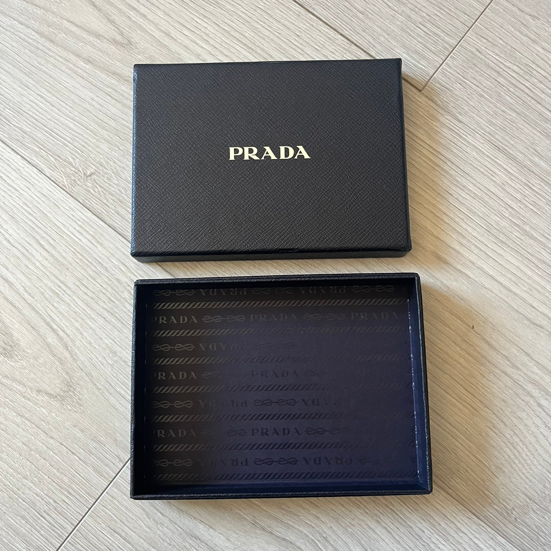 LG Prada KE850 touchscreen phone, the first of its kind with a capacitive display, designed in collaboration with Prada. Sleek black minimalist design, pre-loaded games, PDF and Office support, Bluetooth, and expandable memory. Comes complete with Prada box and leather etui - a collectible milestone in mobile fashion history.