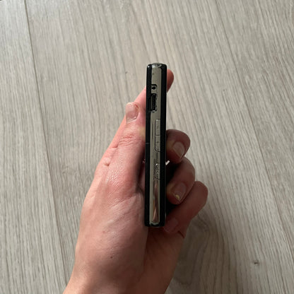 The LG Prada KE850, a groundbreaking collaboration between LG and Prada marked the world’s first capacitive touchscreen phone. Finished in sleek black with minimalist Prada aesthetics, it features media playback, Bluetooth, and expandable memory.&nbsp;