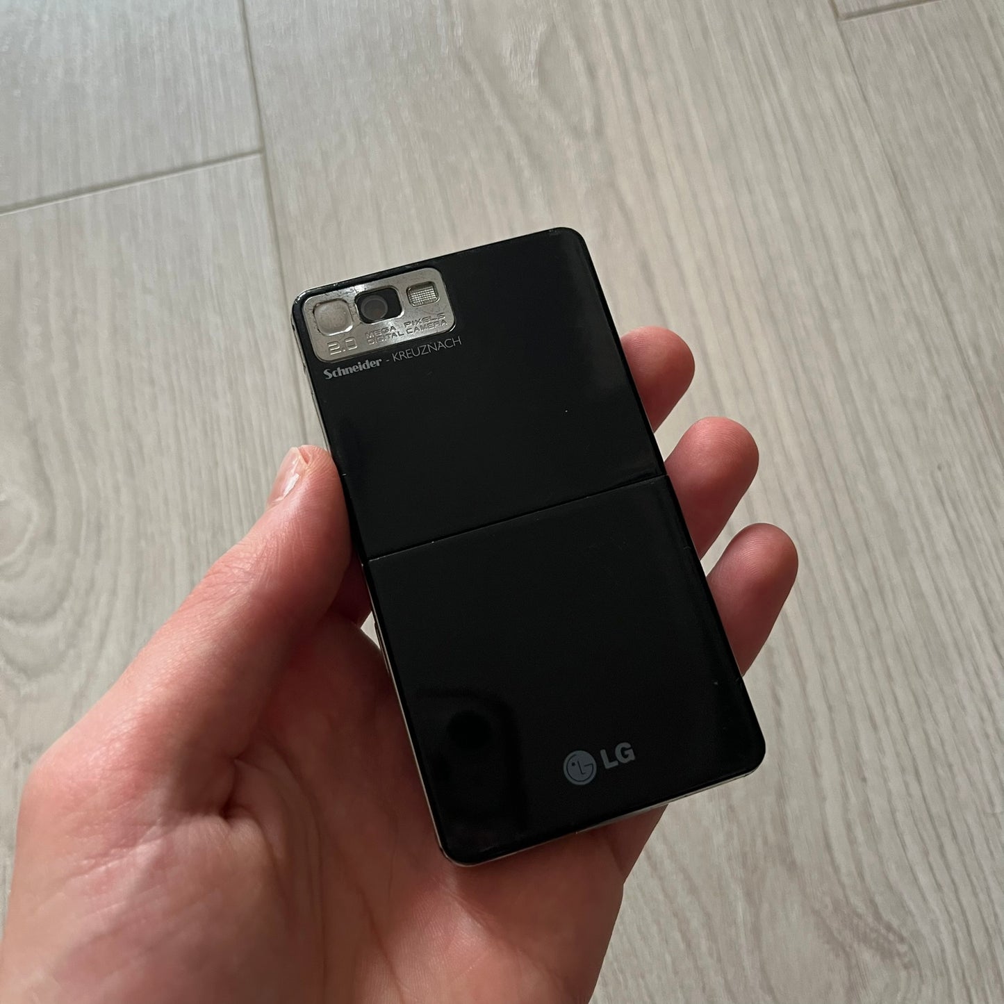 The LG Prada KE850, a groundbreaking collaboration between LG and Prada marked the world’s first capacitive touchscreen phone. Finished in sleek black with minimalist Prada aesthetics, it features media playback, Bluetooth, and expandable memory.&nbsp;