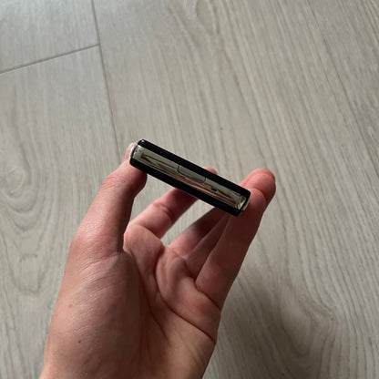 The LG Prada KE850, a groundbreaking collaboration between LG and Prada marked the world’s first capacitive touchscreen phone. Finished in sleek black with minimalist Prada aesthetics, it features media playback, Bluetooth, and expandable memory.&nbsp;