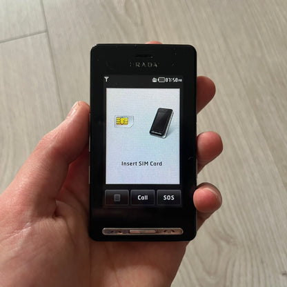 The LG Prada KE850, a groundbreaking collaboration between LG and Prada marked the world’s first capacitive touchscreen phone. Finished in sleek black with minimalist Prada aesthetics, it features media playback, Bluetooth, and expandable memory.&nbsp;