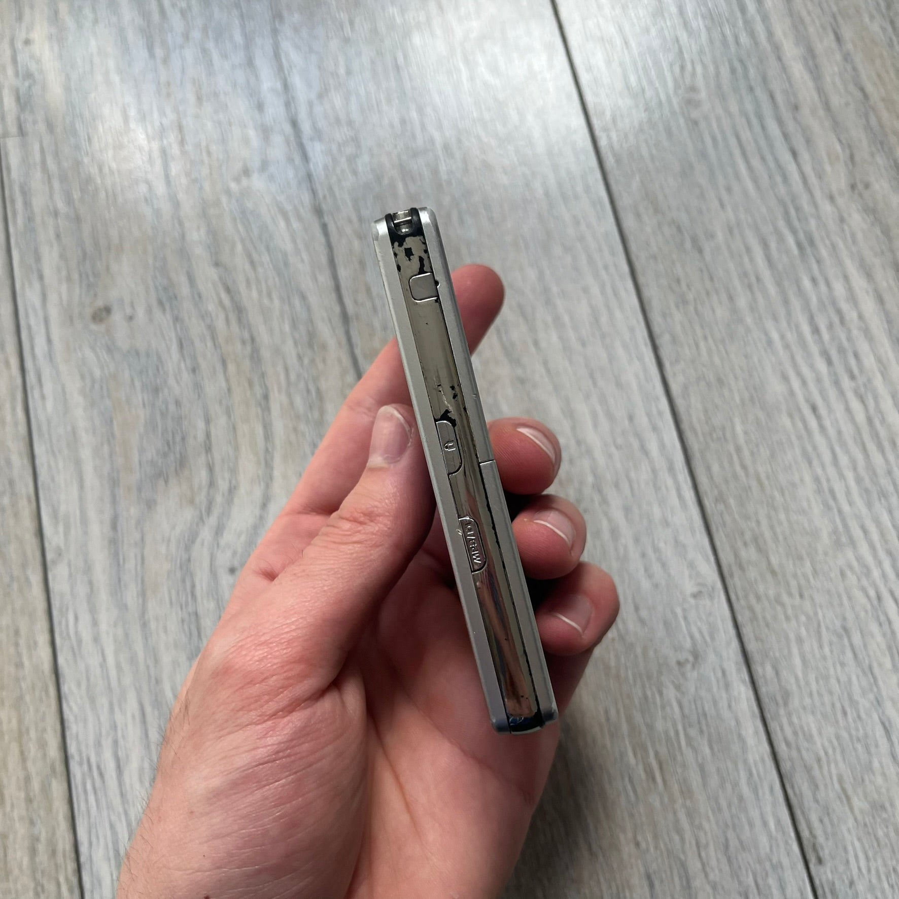 The LG Prada KE850, a groundbreaking collaboration between LG and Prada marked the world’s first capacitive touchscreen phone. Finished in silver and gray with minimalist Prada aesthetics, it features media playback, Bluetooth, and expandable memory. Sim locked.