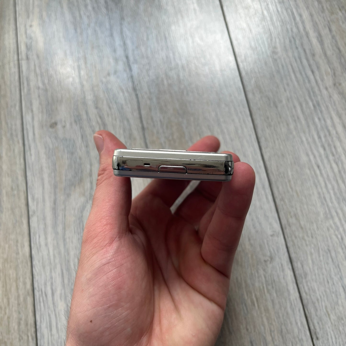 The LG Prada KE850, a groundbreaking collaboration between LG and Prada marked the world’s first capacitive touchscreen phone. Finished in silver and gray with minimalist Prada aesthetics, it features media playback, Bluetooth, and expandable memory. Sim locked.