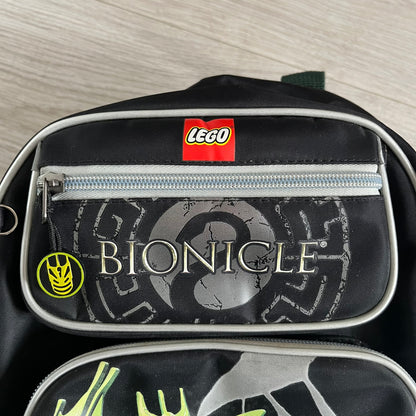 Lego Bionicle 2010 Glatorian Gresh Backpack made by Class Investment in 2010, featuring a front pocket with an embroidered Glatorian Gresh figure and text. The top pocket includes both Bionicle and LEGO logos, along with custom rubber zipper pulls. Finished with two side bottle pockets and additional Bionicle logo details, making it a great rare collectible for fans of the series.