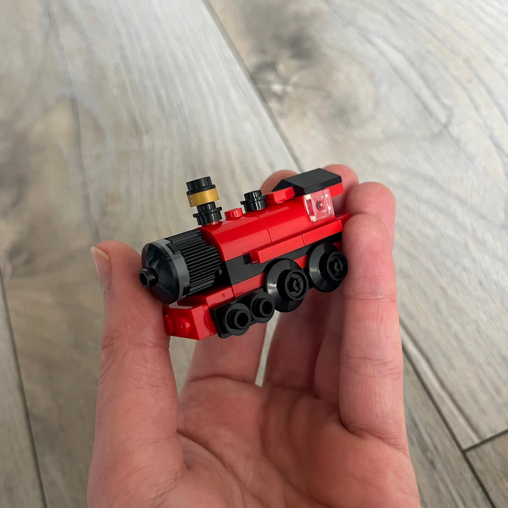 LEGO Hogwarts Express Make and Take Build is a limited promotional LEGO set distributed as an exclusive “make & take” event and not available for retail purchase. The model features a small version of the red Hogwarts Express train from the Harry Potter series, with basic rolling wheels.
