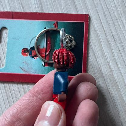 Lego Lil Yachty 'Lil Block' keychain featuring a custom Lego figure of Lil Yachty with red overalls and 3d red dreads. The figure is attached to a Lego-style recreation of the 2016 'Lil Boat' album cover, reimagined in brick graphics. A playful and creative collectible that merges music culture with fan-made Lego artistry, made by TheCanvasDon.