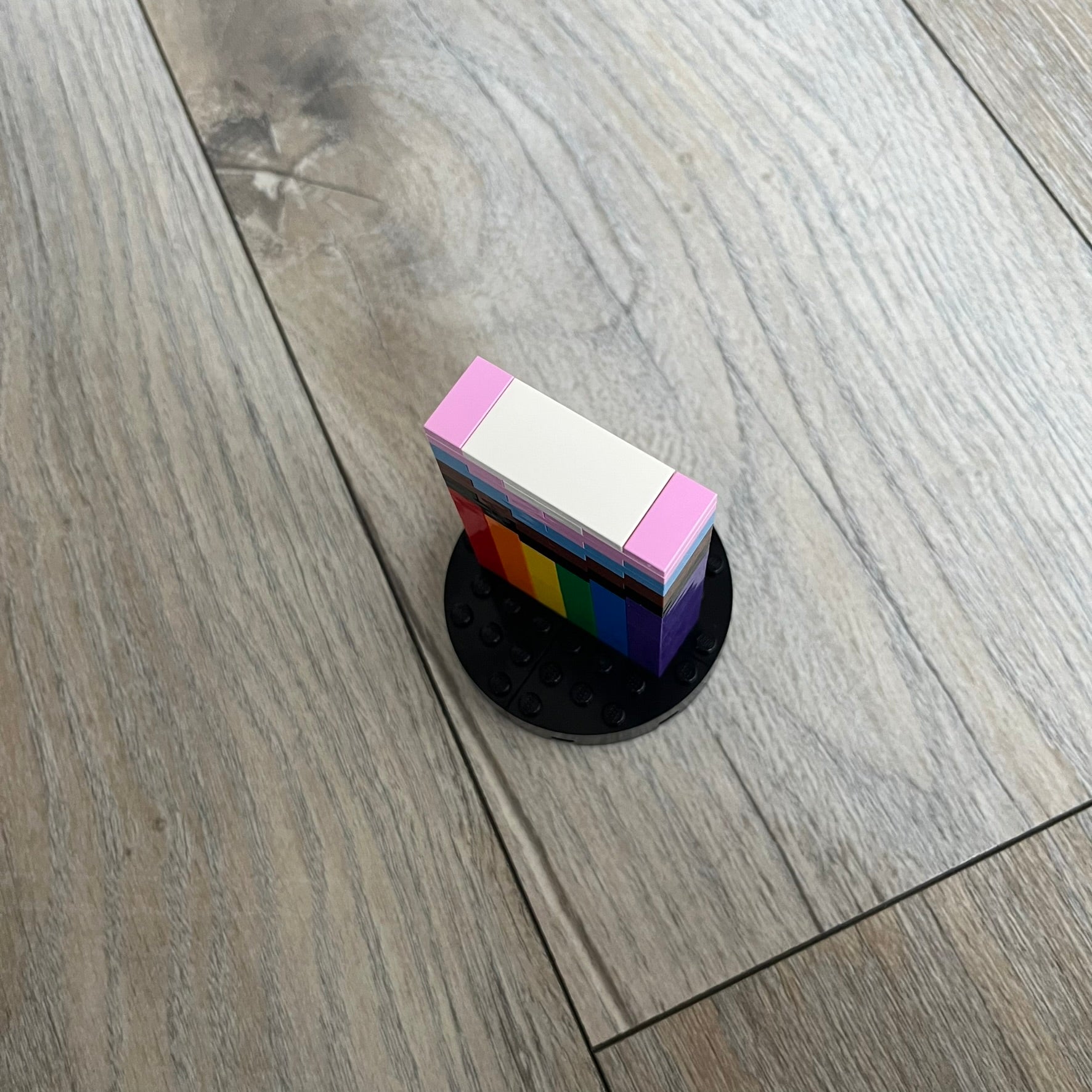 LEGO Pride Flag Make and Take Build is a limited promotional LEGO set distributed as an exclusive in-store “make & take” event and not available for retail purchase. The build forms a small standing Pride flag display model.