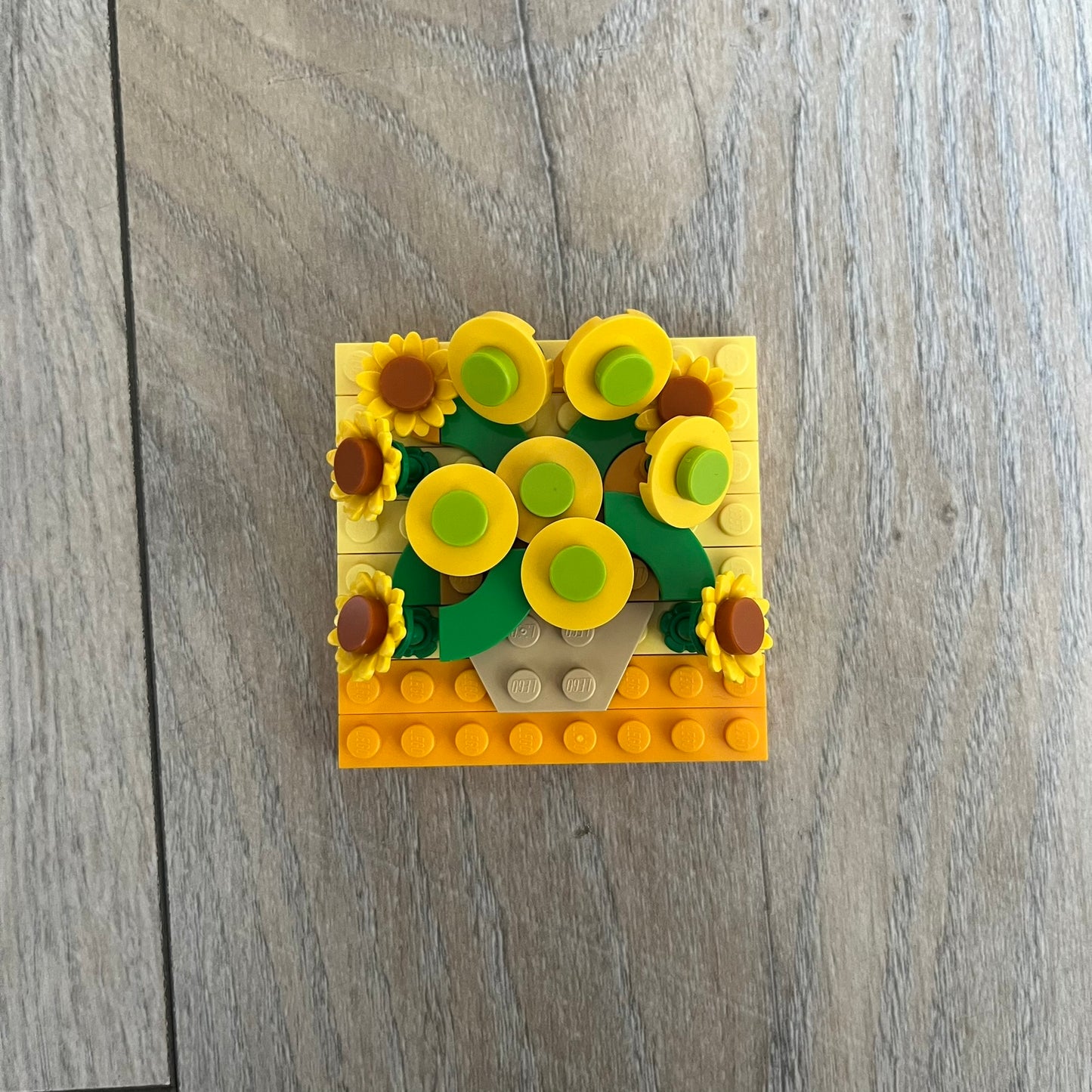 LEGO Sunflowers Make and Take Build is a limited promotional LEGO set distributed as an exclusive “make & take” event and not available for retail purchase. The model features a small 3D interpretation of sunflowers inspired by the famous painting, arranged in a way that resembles the artwork when viewed from above.