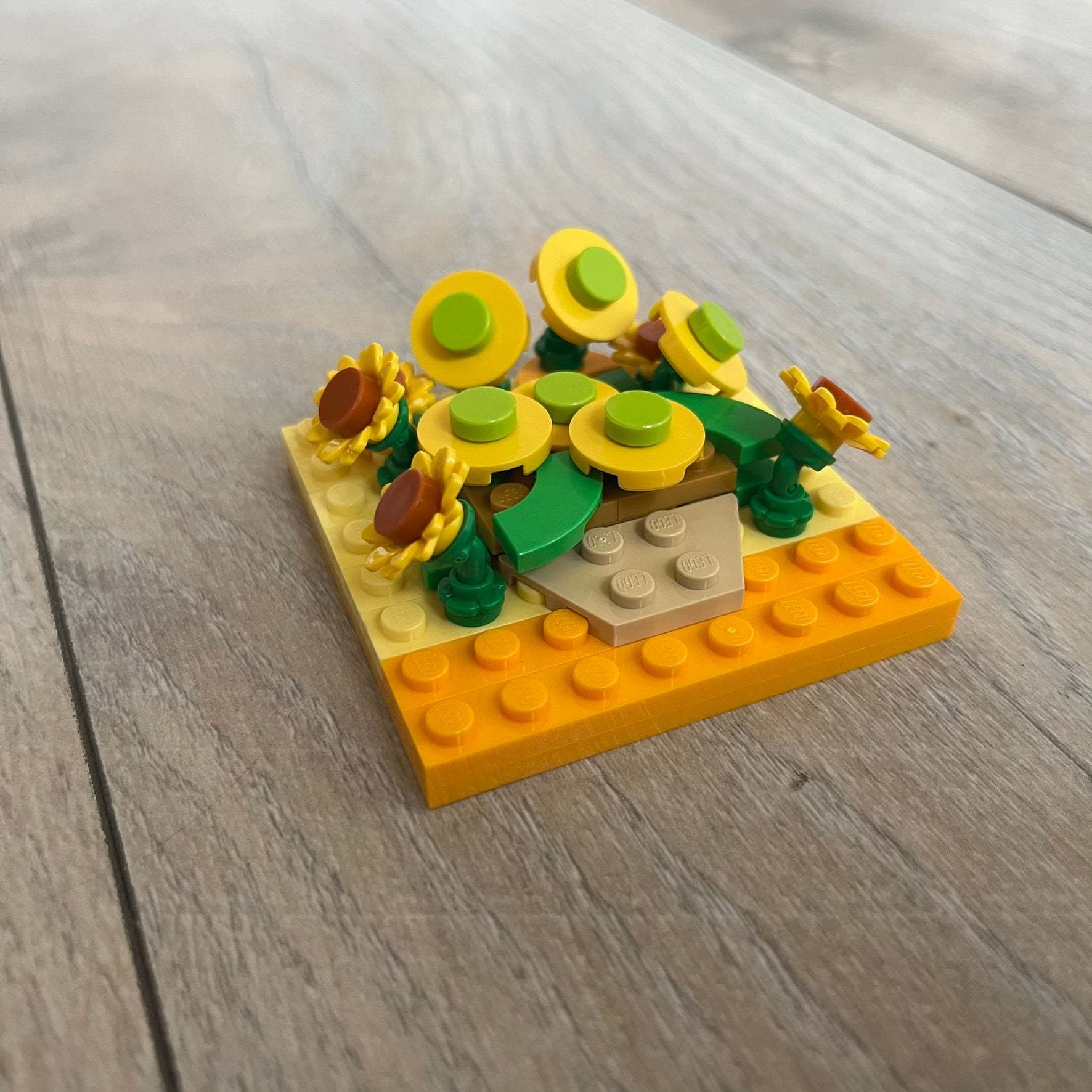 LEGO Sunflowers Make and Take Build is a limited promotional LEGO set distributed as an exclusive “make & take” event and not available for retail purchase. The model features a small 3D interpretation of sunflowers inspired by the famous painting, arranged in a way that resembles the artwork when viewed from above.
