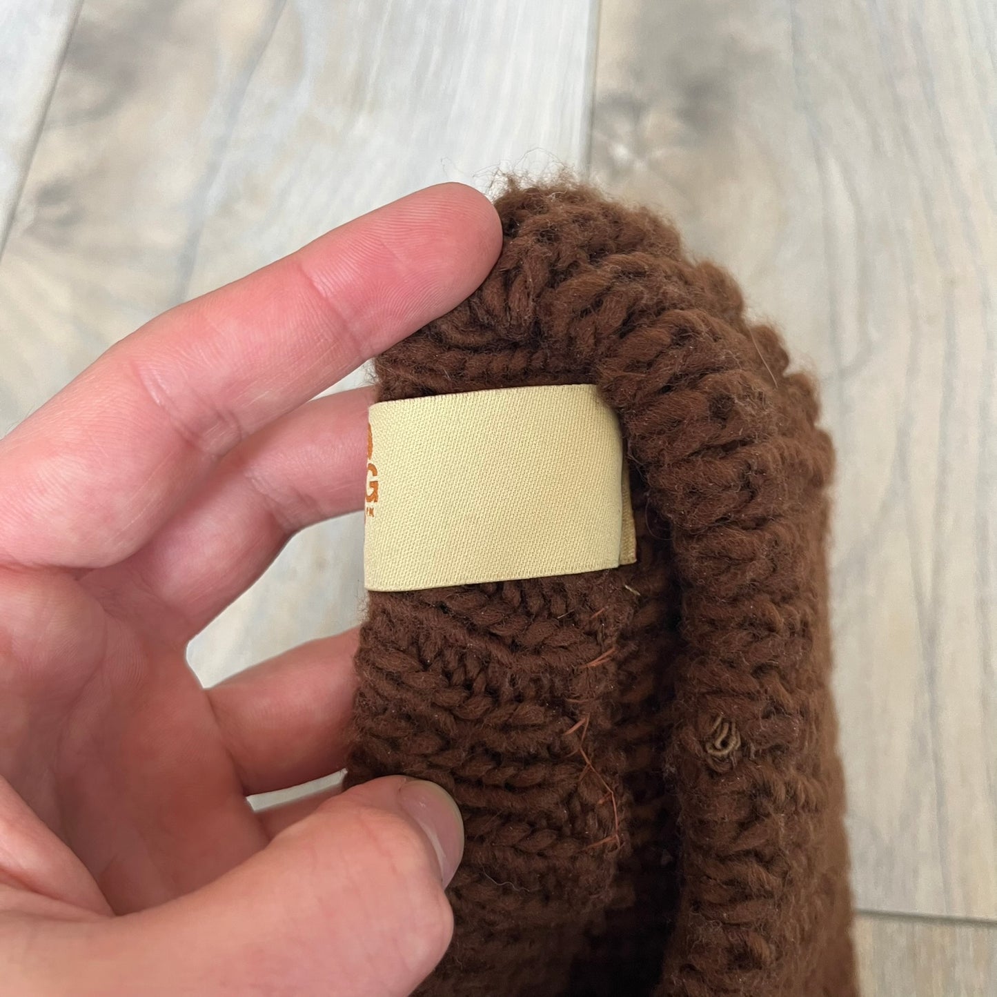 LittleBigPlanet 2009 Europe Exclusive Sackboy Beanie is an officially licensed brown knit beanie made from 100% acrylic. The design is styled after Sackboy and features a beige front tag with an orange Sackboy figure, LittleBigPlanet logo, and SCEE 2009 licensing. This item was released exclusively in the European region. Super rare and rarely seen for sale.
