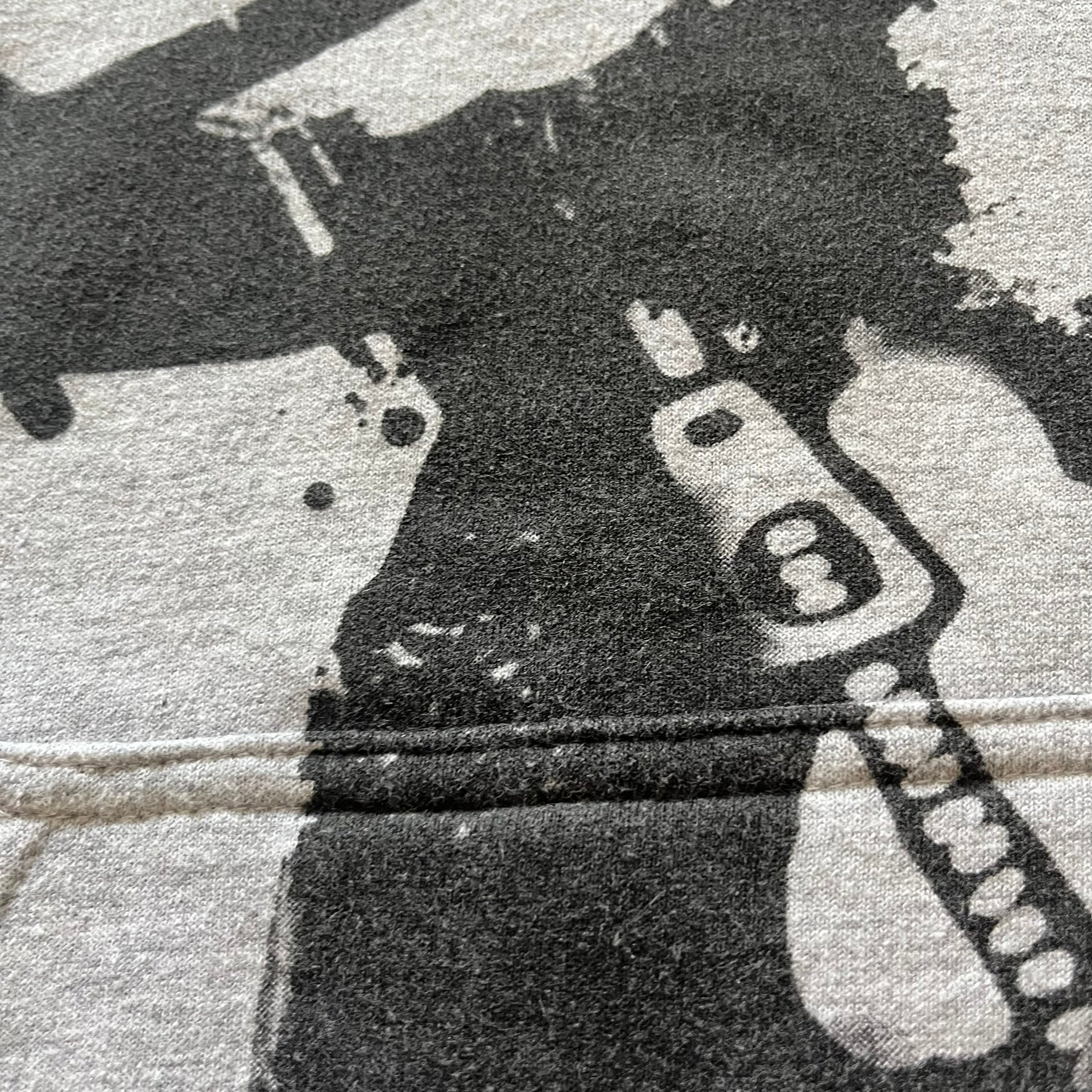 Ultra-rare Little Big Planet hoodie from 2010, made on a Gildan Heavy Blend. Showcases a graffiti like print with Sackboy and logo LBP branding on the pocket with Sony/SCEE licensing. This piece is nearly impossible to find today, making it a standout collectible for fans.