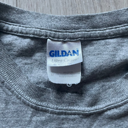 Very-rare Little Big Planet t-shirt from 2010, made on a Gildan Ultra Cotton. Showcases a graffiti like print with Sackboy and LBP logo branding in the bottom right corner with SCEE licensing. One of the rarest LBP pieces, this t-shirt is a true grail for fans and collectors.