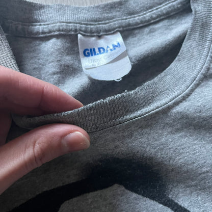 Very-rare Little Big Planet t-shirt from 2010, made on a Gildan Ultra Cotton. Showcases a graffiti like print with Sackboy and LBP logo branding in the bottom right corner with SCEE licensing. One of the rarest LBP pieces, this t-shirt is a true grail for fans and collectors.