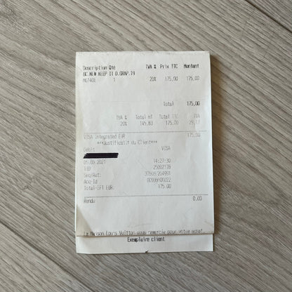 Receipt on a wooden surface
