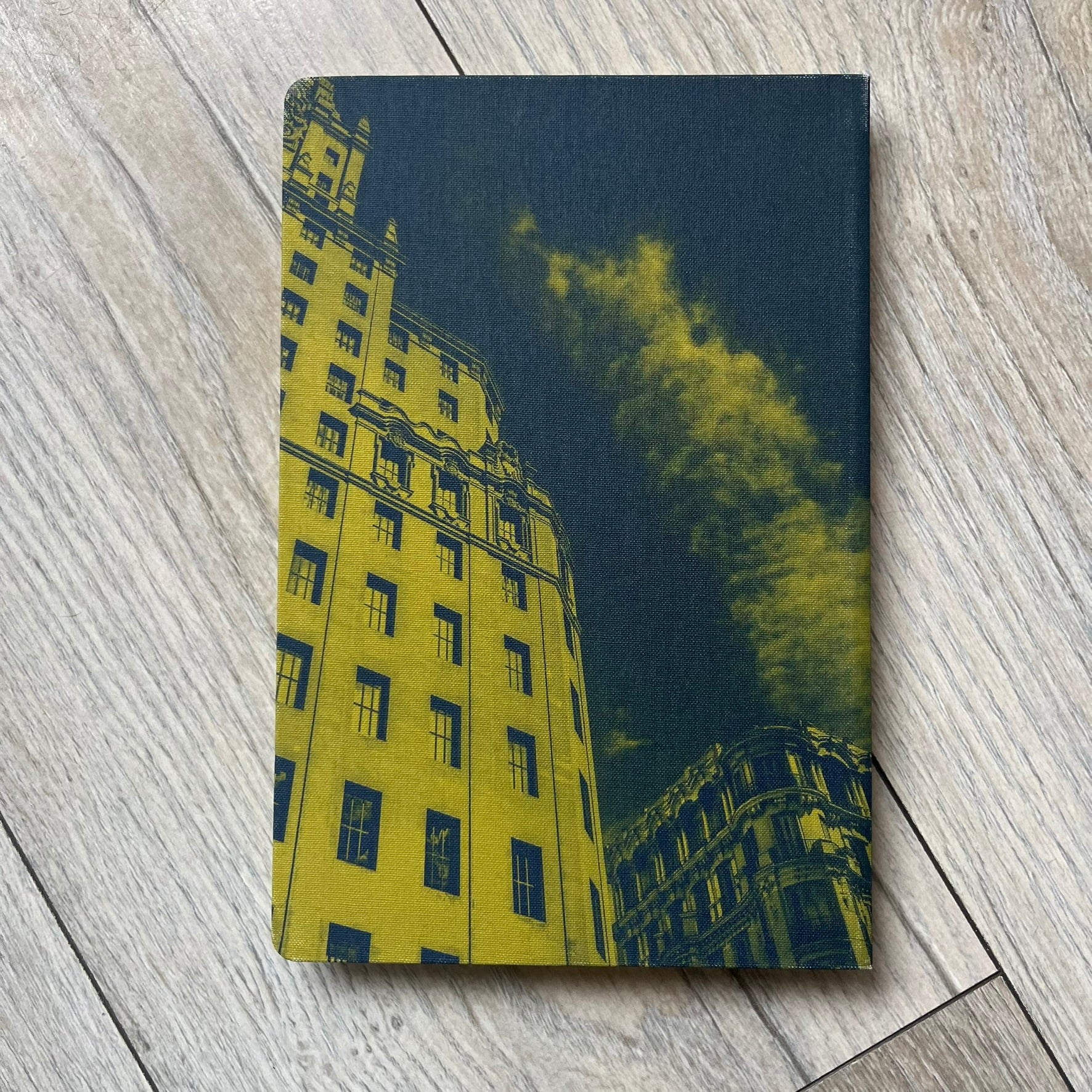 Louis Vuitton “Madrid” City Guide is a 320-page English-language travel book with cloth binding. It features contributions from writers Stephen Phelan, Ian Mount, Michael Stothard, and Joanna Wivell, with a special guest contribution from Sara Hurtado. Photography is provided by Mat Jacob of the Tendance Floue collective, offering curated insights into Madrid’s hotels, restaurants, cultural landmarks, and creative hubs