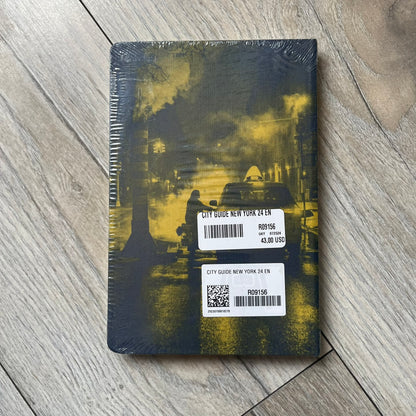 Louis Vuitton “New York” City Guide is an English-language travel book with cloth binding, featuring contributions from writers Carole Sabas, Marie Salomé Peyronnel, Aude Revier, and Fabrice Gaucher. The guide includes special guest contributions from Hank Willis Thomas and Rujeko Hockley, with exclusive photography by Pascal Aimar. It covers New York’s hotels, restaurants, cultural landmarks, and creative hubs, providing curated insights into the city’s art, design, gastronomy, and culture.