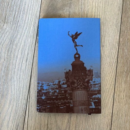  Louis Vuitton Paris City Guide is an English-language travel guide featuring 360 pages with a cloth-bound hardcover. Measuring 12.4 × 9.5 inches, it includes recommendations for hotels, restaurants, museums, shopping, and cultural attractions throughout Paris. The edition features guest contributions by Enzo Lefort, photography by the Tendance Floue collective, and writing by Pierre Leonforte, Pierre Groppo, Katia Kulawick-Assante, François Simon, Isabelle Valembras-Dahirel, Marie-Hélène Brunet-Lhoste, Lau