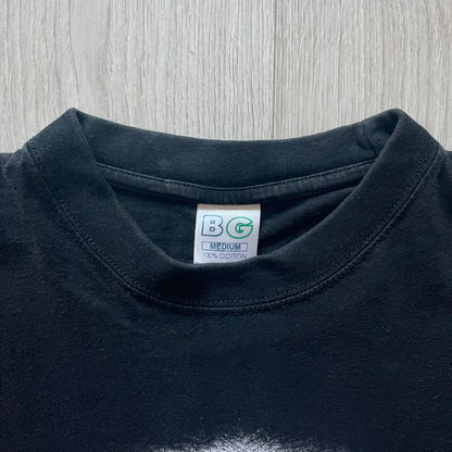 Marilyn Manson Holy Wood Face Tee from 2000, made on a black BG blank. Features a large front graphic of Manson’s face with signature white makeup, red accents, and eye contact. The back includes red Marilyn Manson text with a small 2000 Giant license, great piece from the Holy Wood era.