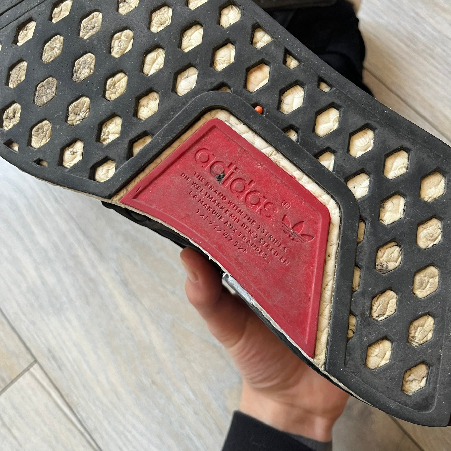 Mastermind x adidas NMD XR1 “Mastermind” Sneakers BA9726 are a 2016 collaboration between adidas and Mastermind Japan, the Japanese label founded by Masaaki Homma. The sneaker features a Core Black/Core Black/White colorway with a polyester mesh upper, rubber sole, and adidas Boost midsole. Mastermind’s signature skull and crossbones logo appears on the leather cage and tongue, while the pair includes black laces and follows the NMD XR1 silhouette released on September 20, 2016 under style code BA9726