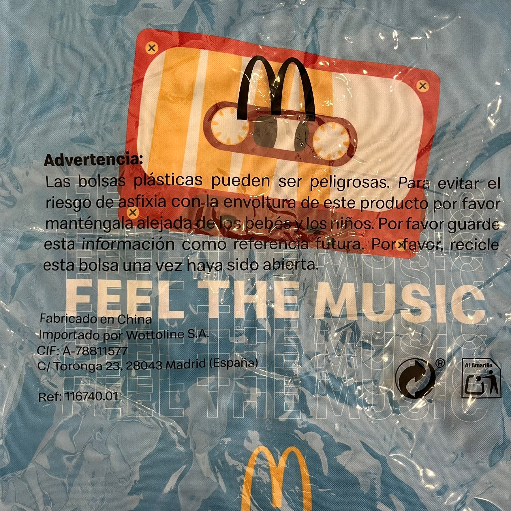 The McDonald’s Spain “Feel The Music” Backpack comes in a blue and yellow colorway with a vintage cassette graphic on the front. Constructed from lightweight non-woven synthetic fabric, it includes yellow straps and a zip-top closure. A collectible promotional item released by McDonald’s Spain.