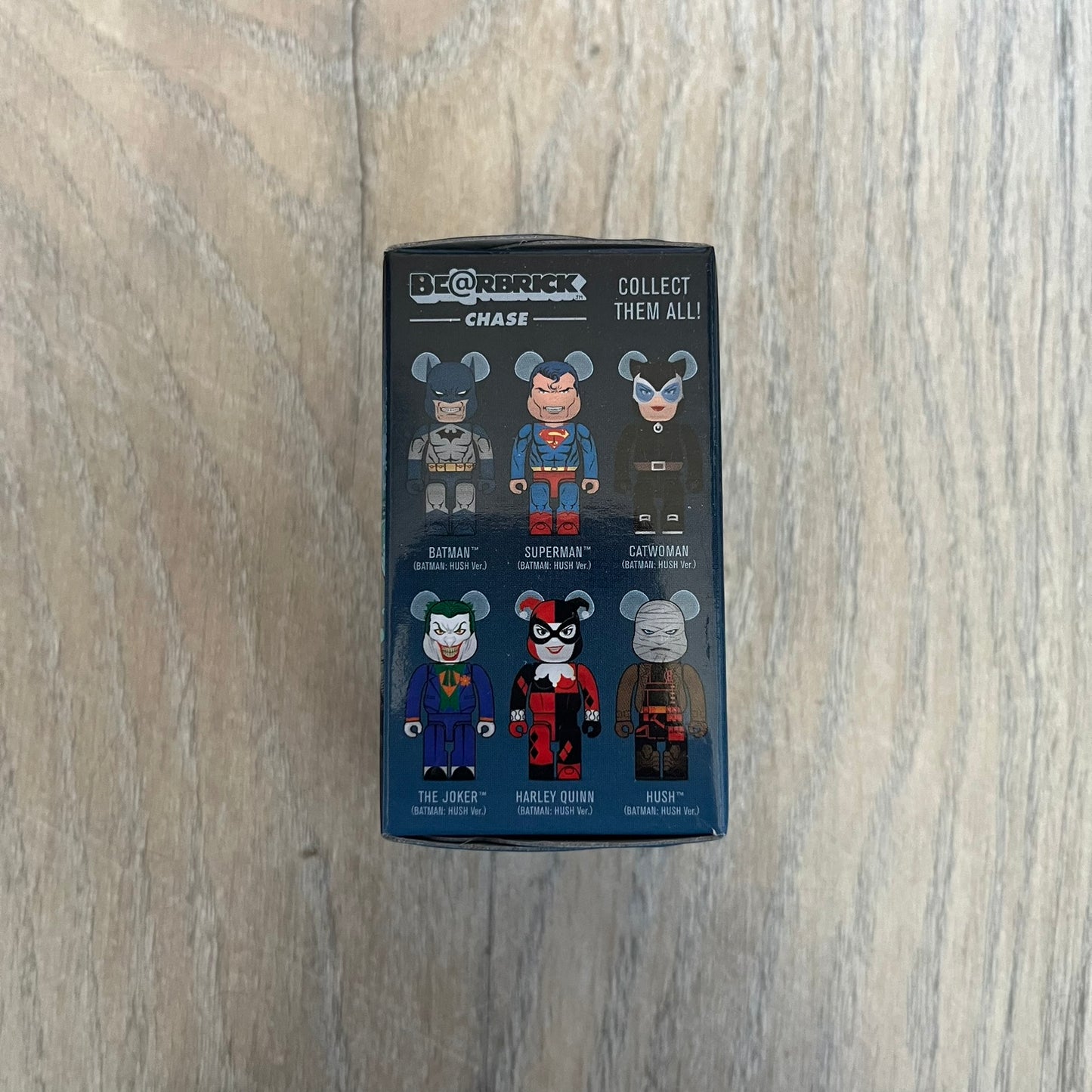 Medicom Toy BE@RBRICK 100% Chase Batman: Hush Series Blind Box (Series 1) is a collectible figure release from Medicom Toy based on the comic storyline Batman: Hush. Each blind box contains one random 100% scale BE@RBRICK figure with articulation at the neck, shoulders, and hips. The lineup includes characters such as Batman, Superman, Catwoman, The Joker, Harley Quinn, and Hush, with the specific figure only revealed upon opening.