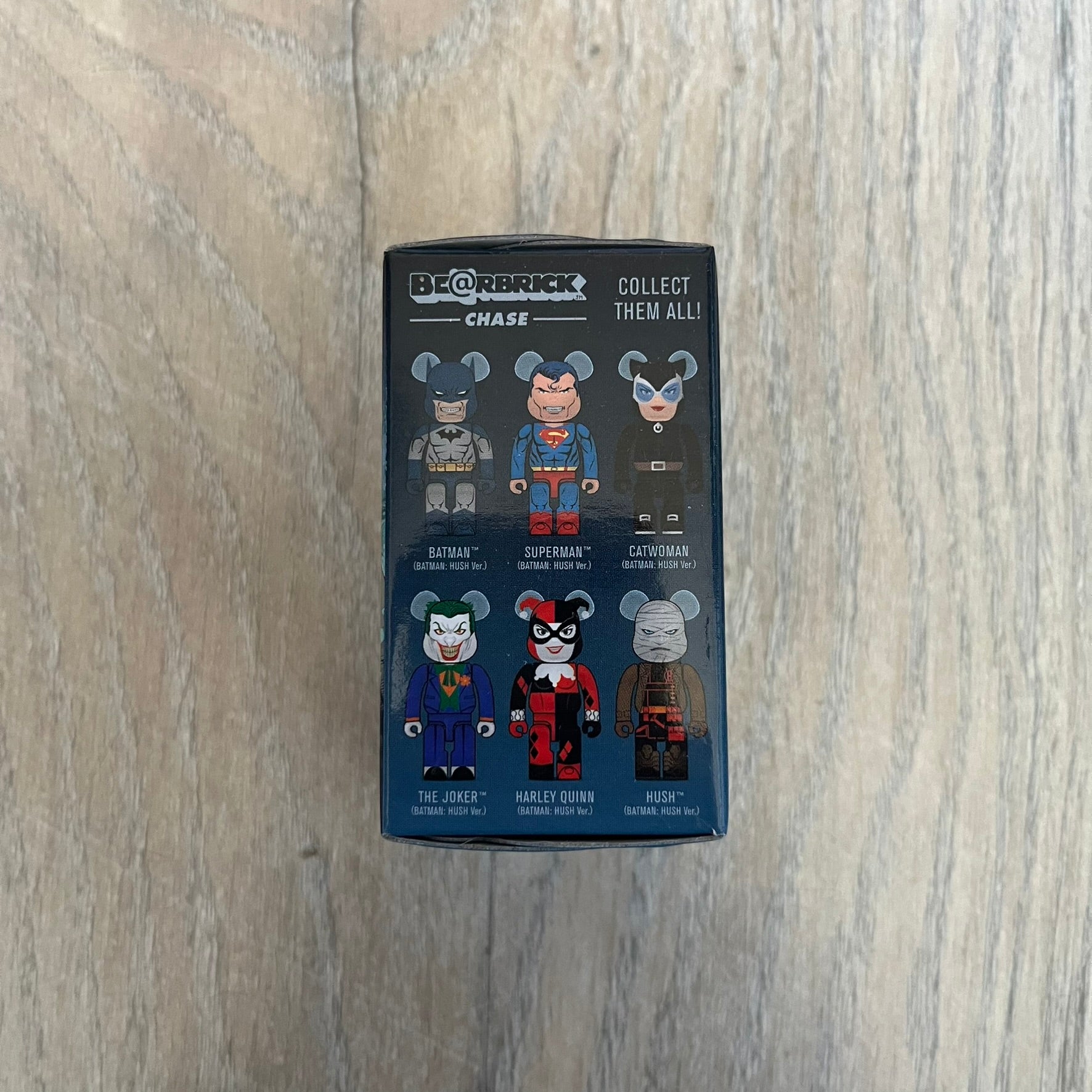 Medicom Toy BE@RBRICK 100% Chase Batman: Hush Series Blind Box (Series 1) is a collectible figure release from Medicom Toy based on the comic storyline Batman: Hush. Each blind box contains one random 100% scale BE@RBRICK figure with articulation at the neck, shoulders, and hips. The lineup includes characters such as Batman, Superman, Catwoman, The Joker, Harley Quinn, and Hush, with the specific figure only revealed upon opening.