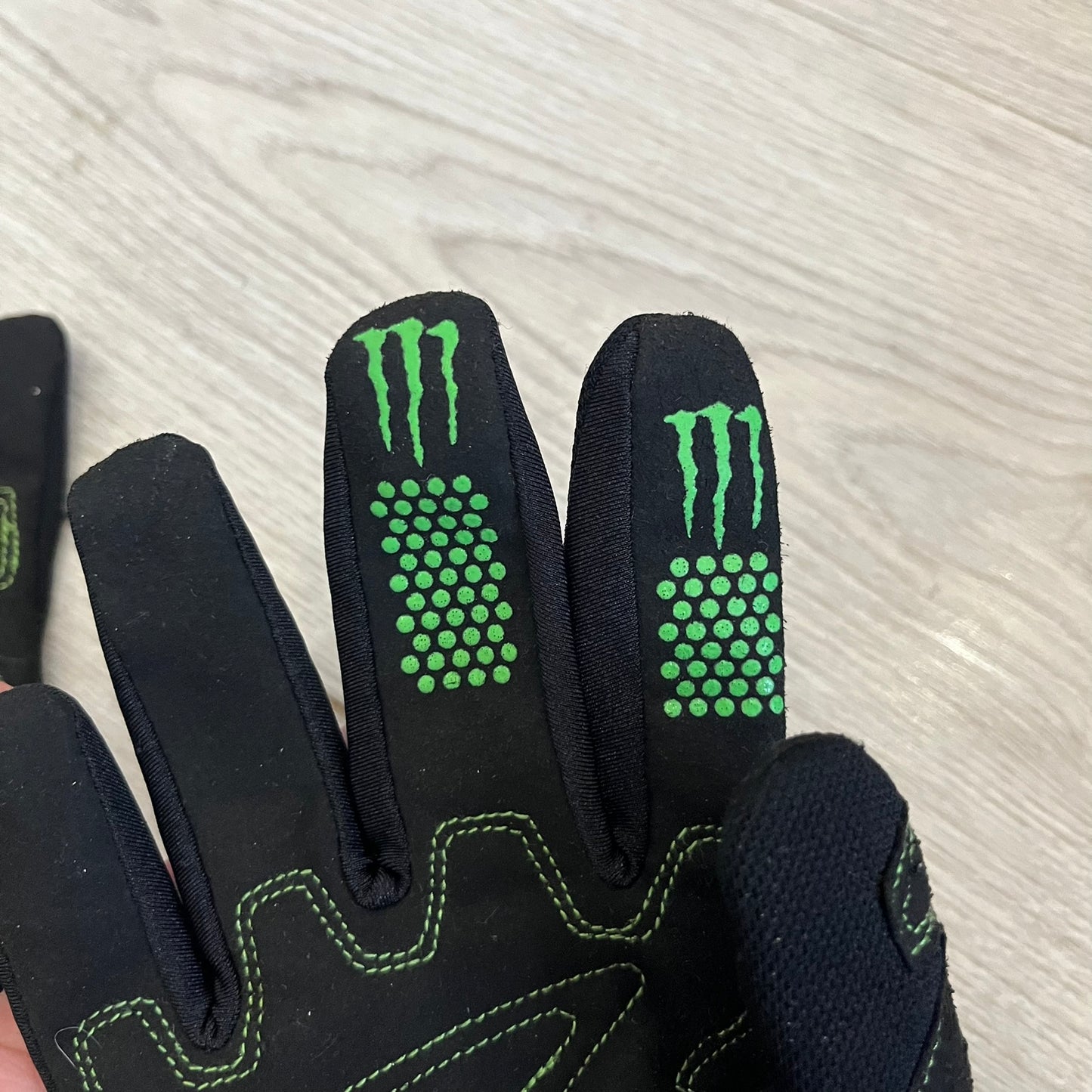 O’Neal’s Monster “Ricky Dietrich” Gloves combine professional racing technology with an iconic Monster Energy aesthetic. Designed for motocross and mountain biking, they feature a black base, green highlights, and bold Monster logos for maximum visual impact. Known for fit, control, and durability, these O’Neal riding gloves reflect over 30 years of performance innovation.