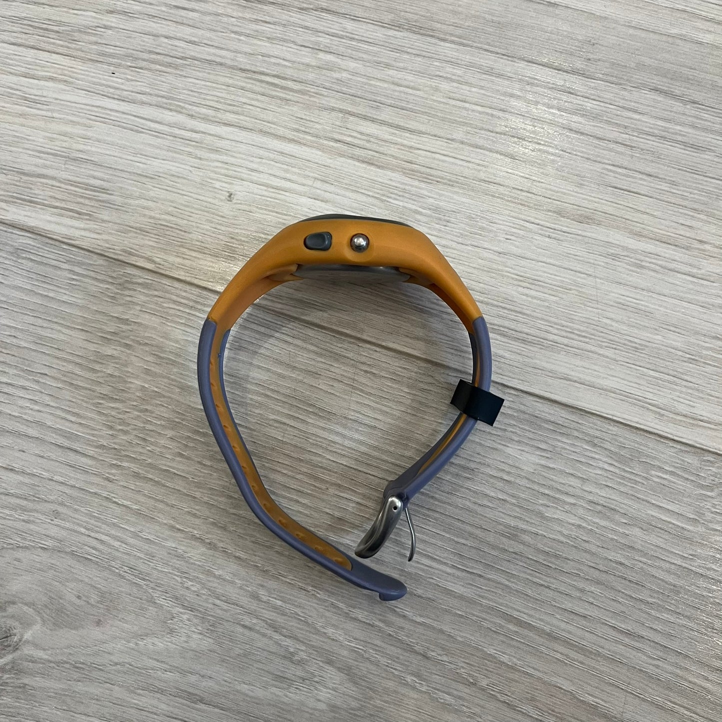 Nike ACG Thermal Gauge Watch featuring an ani-digi display with temperature, date, timer, alarm, and counter functions. Designed with a durable stainless-steel and plastic build, a white dial with grey outline, and an orange strap with the ACG logo. Water-resistant up to 50m, this Nike ACG outdoor watch blends utility with signature 90s–2000s adventure styling.