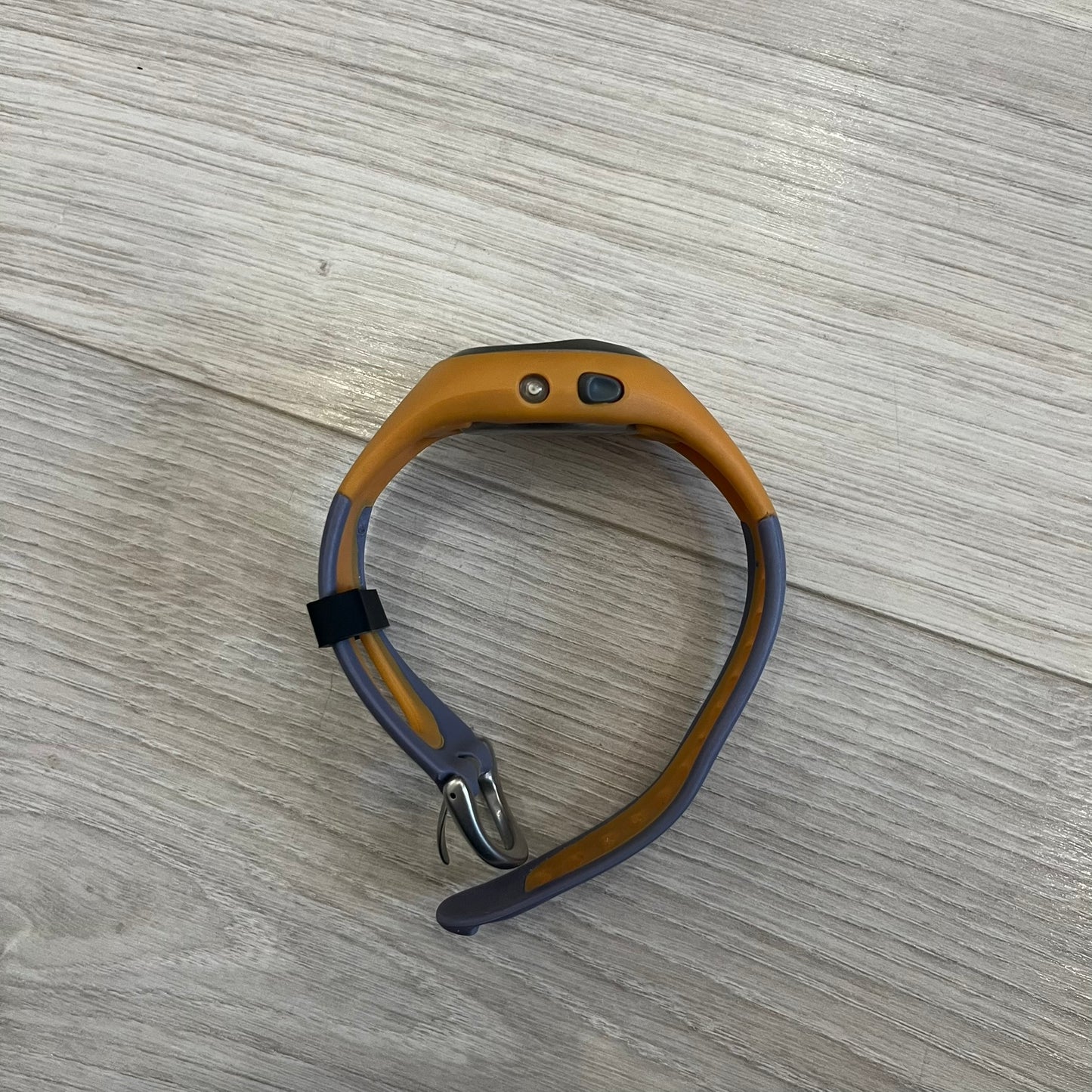 Nike ACG Thermal Gauge Watch featuring an ani-digi display with temperature, date, timer, alarm, and counter functions. Designed with a durable stainless-steel and plastic build, a white dial with grey outline, and an orange strap with the ACG logo. Water-resistant up to 50m, this Nike ACG outdoor watch blends utility with signature 90s–2000s adventure styling.