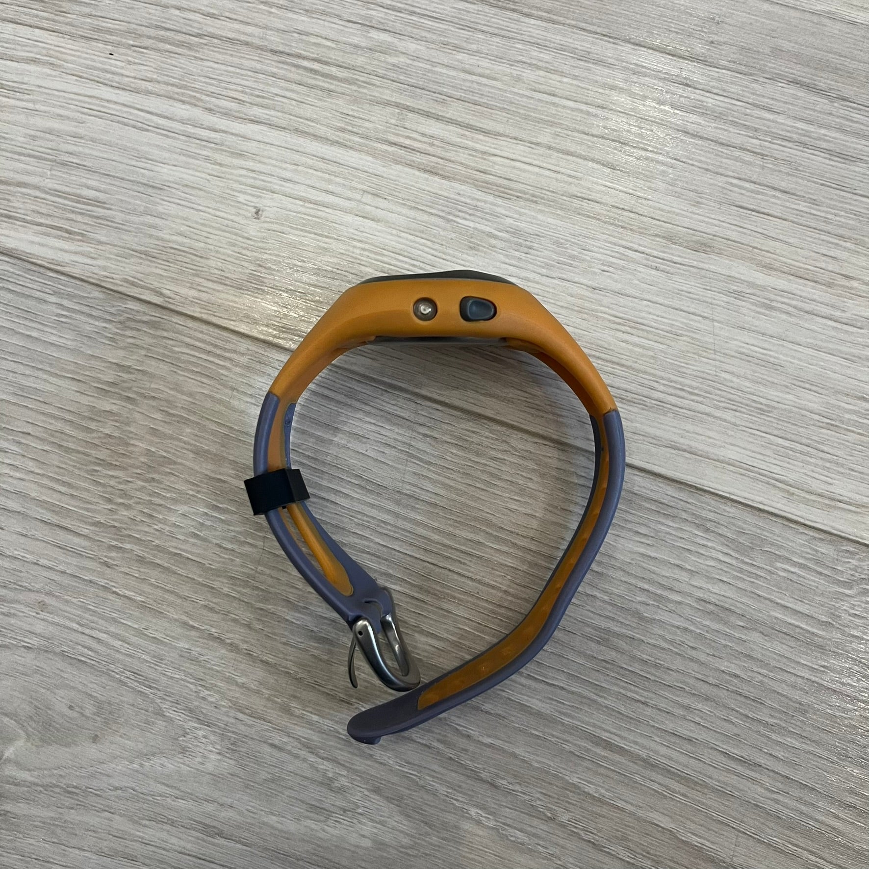 Nike ACG Thermal Gauge Watch featuring an ani-digi display with temperature, date, timer, alarm, and counter functions. Designed with a durable stainless-steel and plastic build, a white dial with grey outline, and an orange strap with the ACG logo. Water-resistant up to 50m, this Nike ACG outdoor watch blends utility with signature 90s–2000s adventure styling.