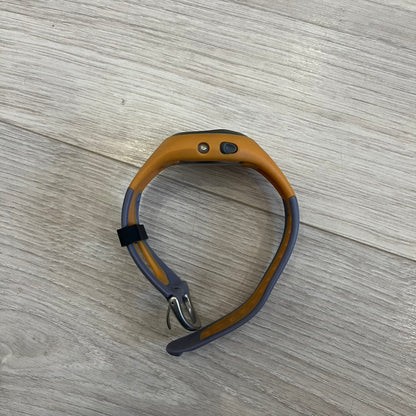 Nike ACG Thermal Gauge Watch featuring an ani-digi display with temperature, date, timer, alarm, and counter functions. Designed with a durable stainless-steel and plastic build, a white dial with grey outline, and an orange strap with the ACG logo. Water-resistant up to 50m, this Nike ACG outdoor watch blends utility with signature 90s–2000s adventure styling.