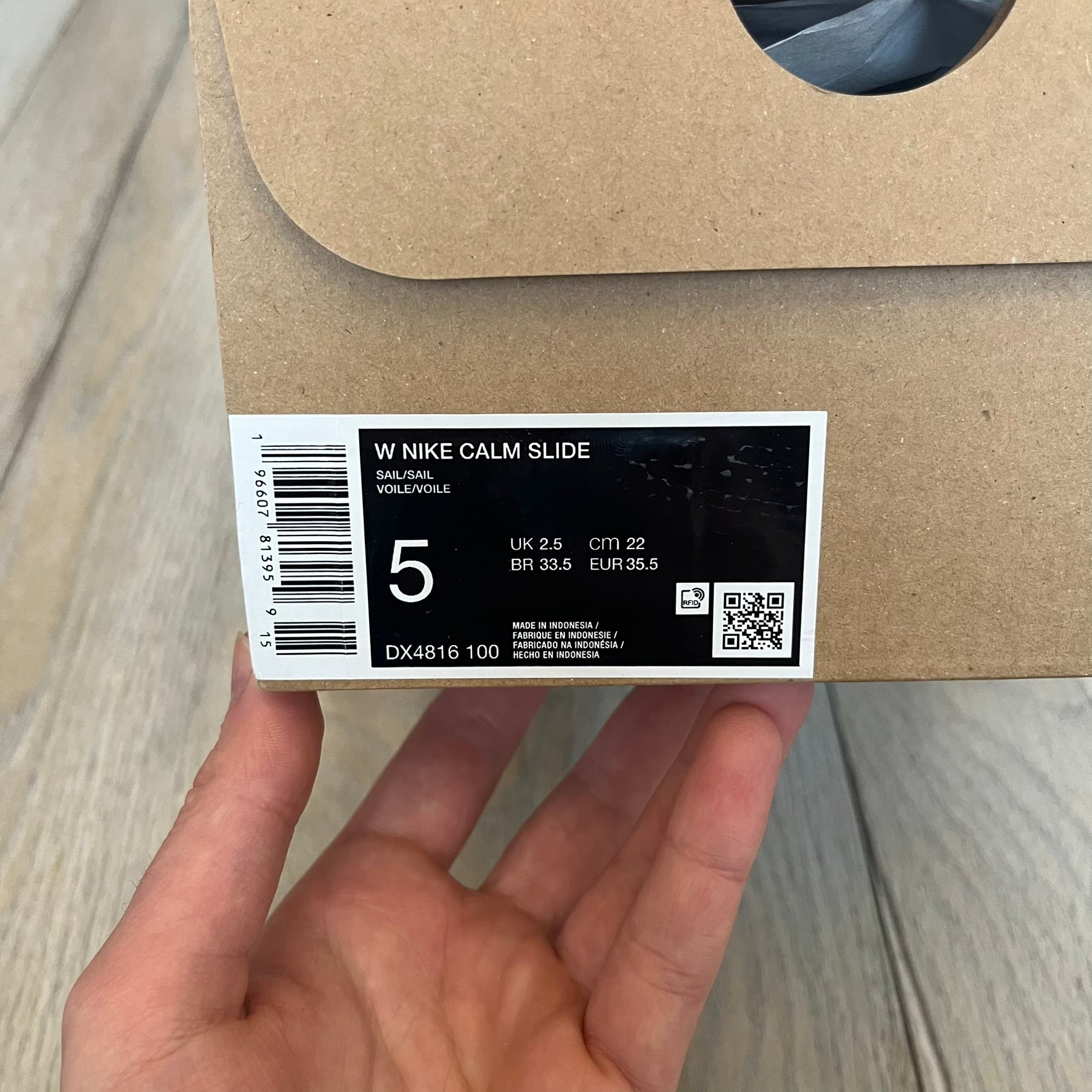 Nike Calm Wmns “Sail” Slide Sandals are women’s slip-on slides released in 2023, featuring a monochromatic Sail/White colorway and a one-piece foam construction. The design includes a contoured footbed with textured detailing for grip, a waterproof outer shell, and a midfoot strap with a debossed Nike Swoosh logo. A full rubber outsole provides durable traction, making this model suitable for everyday wear and wet conditions.