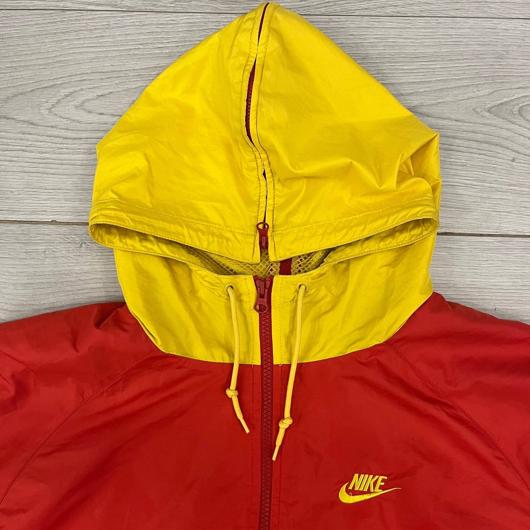 nike windbreaker yellow red blue