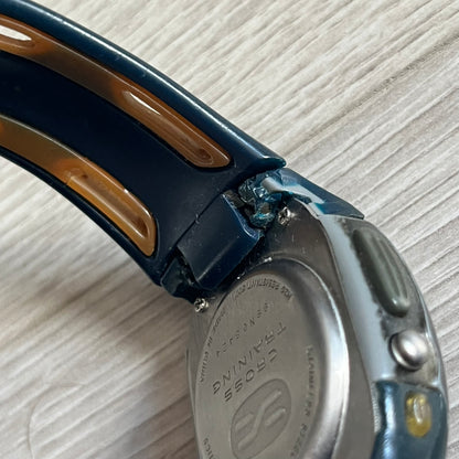 Nike Sports Chrono Cross Training Watch (WX0015) featuring a unique ana-digi “Covert” design with a partial hood over the analog dial. The display combines a three-hand analog setup with a curved dual-section LCD showing time, day, and mode. Water-resistant up to 50m and equipped with chronograph, timer, alarm, and dual-time functions, this model reflects Nike’s peak era of performance-driven digital innovation.