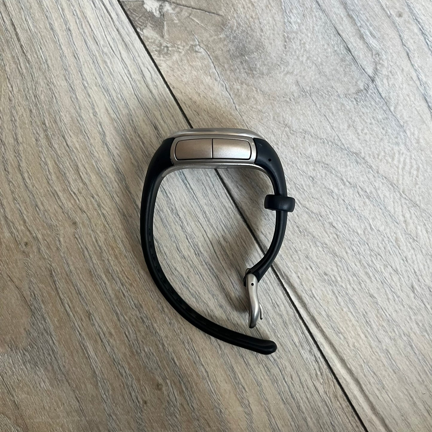 Nike Imara HRM SM0032 Digital Watch is a digital wristwatch featuring a silver case with gray-outlined display and a black rubber strap. The watch includes backlight functionality, multiple modes, and a chest heart rate monitor, with water resistance up to 59 meters. It comes with original box, papers, and a plastic store display.