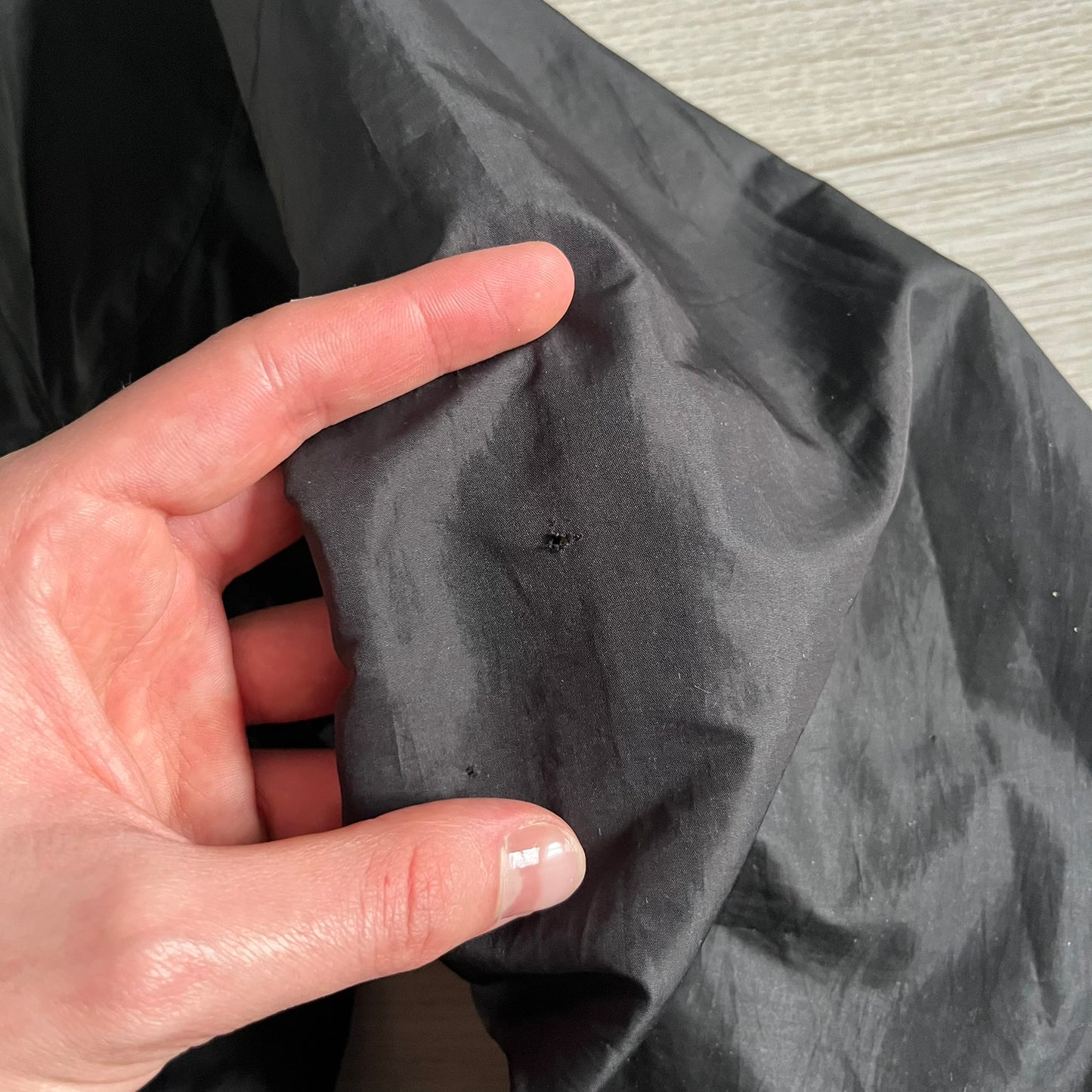 Nike Jamaica Olympics 2008 Split Windbreaker designed by Jarrett Reynolds. Features a black base with a yellow cross on the front inspired by the Jamaican flag. Green bottom hem and details. Dual side zippers allow the jacket to split in half and be combined with other pieces from the collection, with a small Jamaica flag detail inside the pocket.