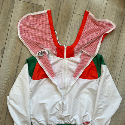 Nike Mexico Olympics Split Windbreaker from 2008, created by designer Jarrett Reynolds. Crafted in green/white/red, with a white lower half, red upper half and green hems/shoulders. Small Nike red embroidery finishes the jacket design. This innovative jacket can be zipped apart on both sides and merged with other compatible models.