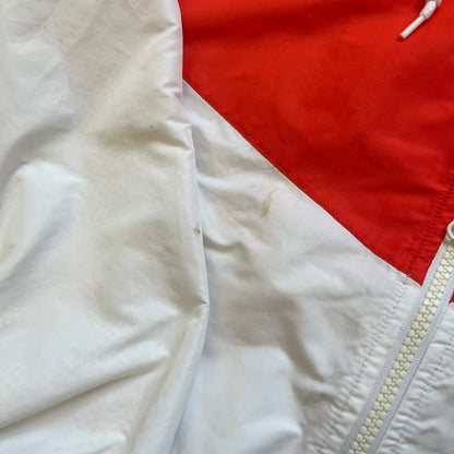 Nike Mexico Olympics Split Windbreaker from 2008, created by designer Jarrett Reynolds. Crafted in green/white/red, with a white lower half, red upper half and green hems/shoulders. Small Nike red embroidery finishes the jacket design. This innovative jacket can be zipped apart on both sides and merged with other compatible models.